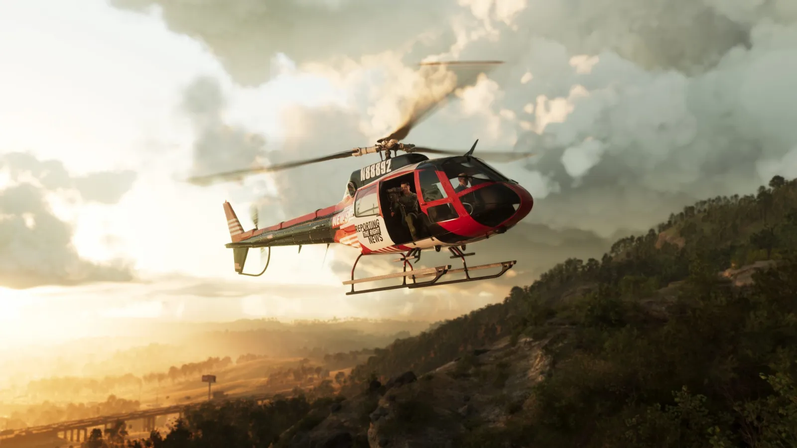 A helicopter flying low over a forested ridge at sunset in GTA 6's Mount Kalaga National Park