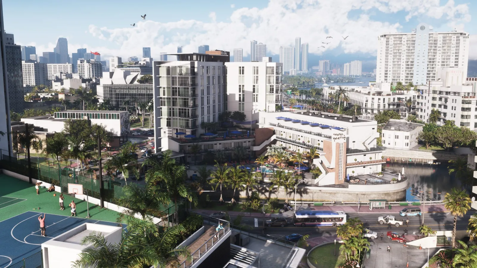 Daytime aerial of Vice City in GTA 6, showing dense blocks and the distant downtown skyline